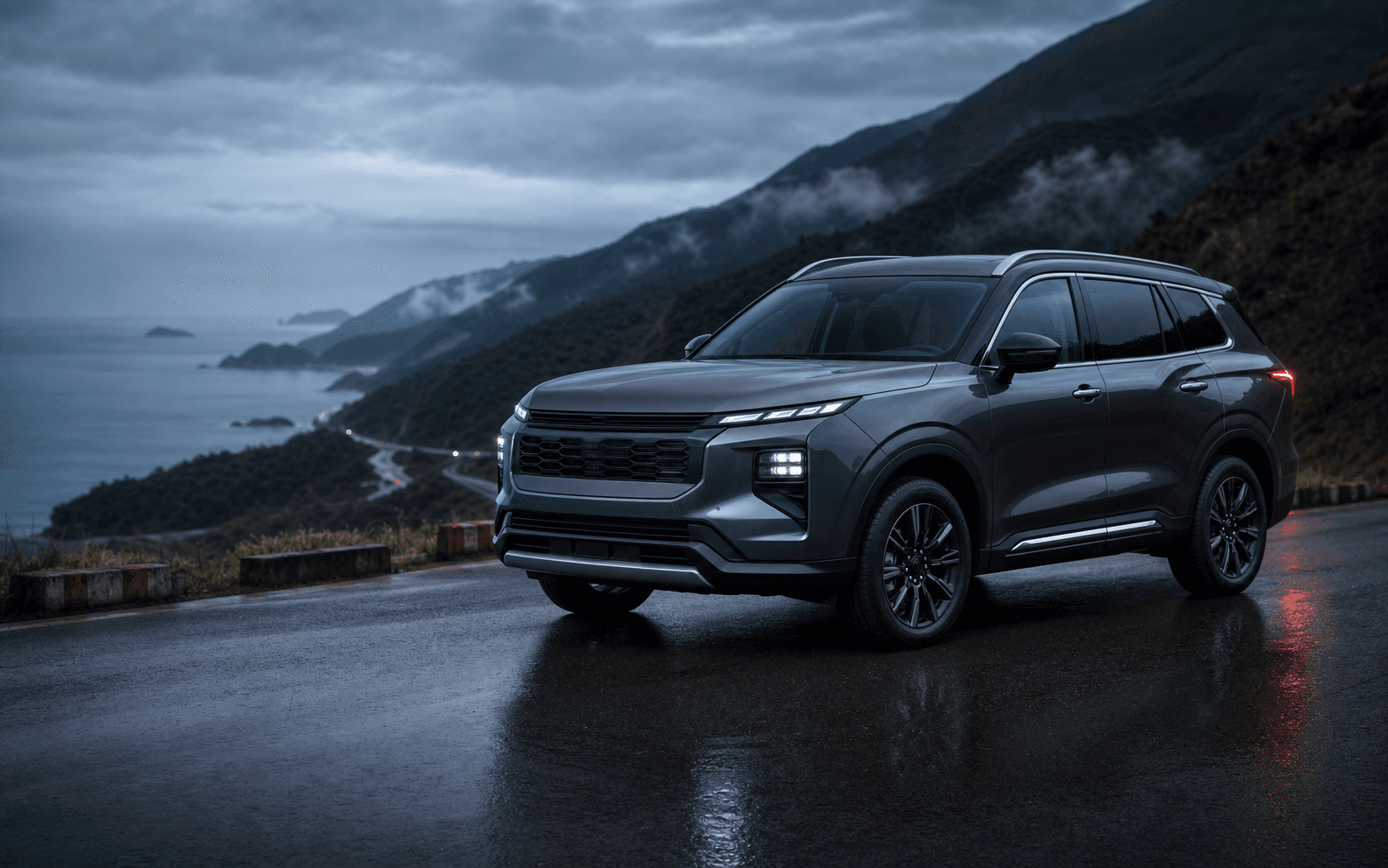 Graphite seven-seat SUV on a coastal road